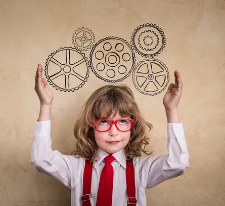 Girl with gears on her hands
