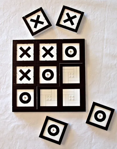 Black and white checkers on table