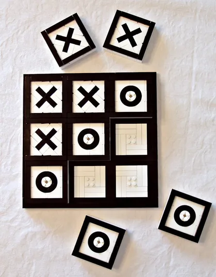 Black and white checkers on table