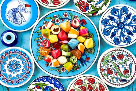 Colorful plates and bowls filled with assorted candies
