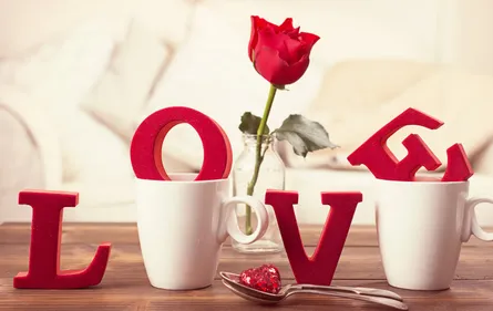 Two cups love word heart
