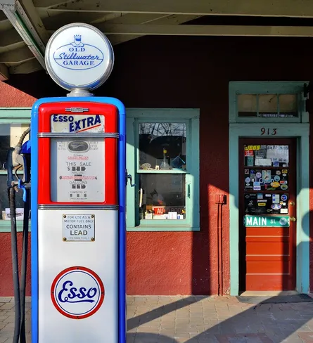 Gas pump on sidewalk