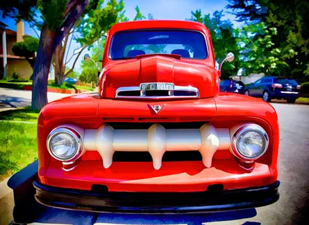 Red truck parked in driveway