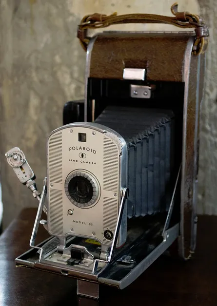 Antique camera on wooden table
