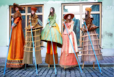 Four people wearing costumes