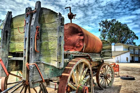 Vintage trailer, old rusted truck, horse drawn carriage