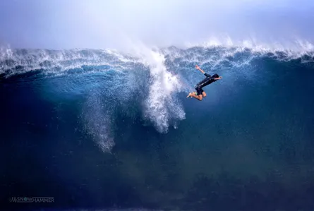 Huge wave surfer