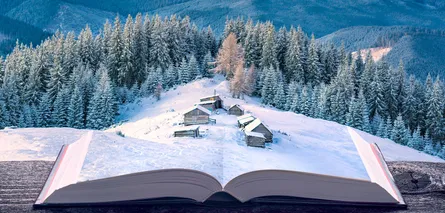 Open book on snowy mountain