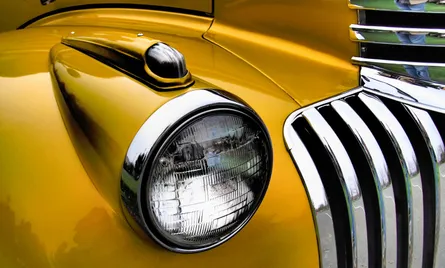 Yellow car with chrome headlight