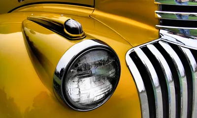Yellow car with chrome headlight