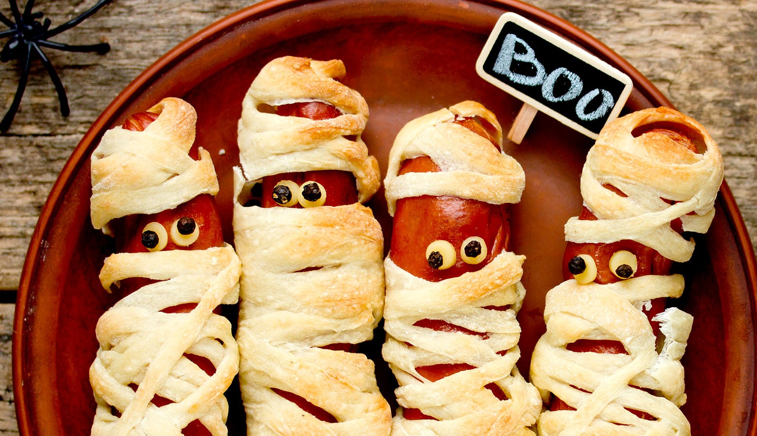 Creepy hot dogs wrapped in dough