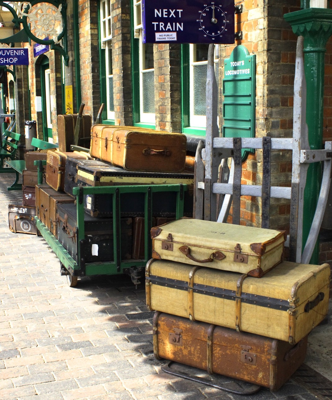 Old Suitcases on Platform