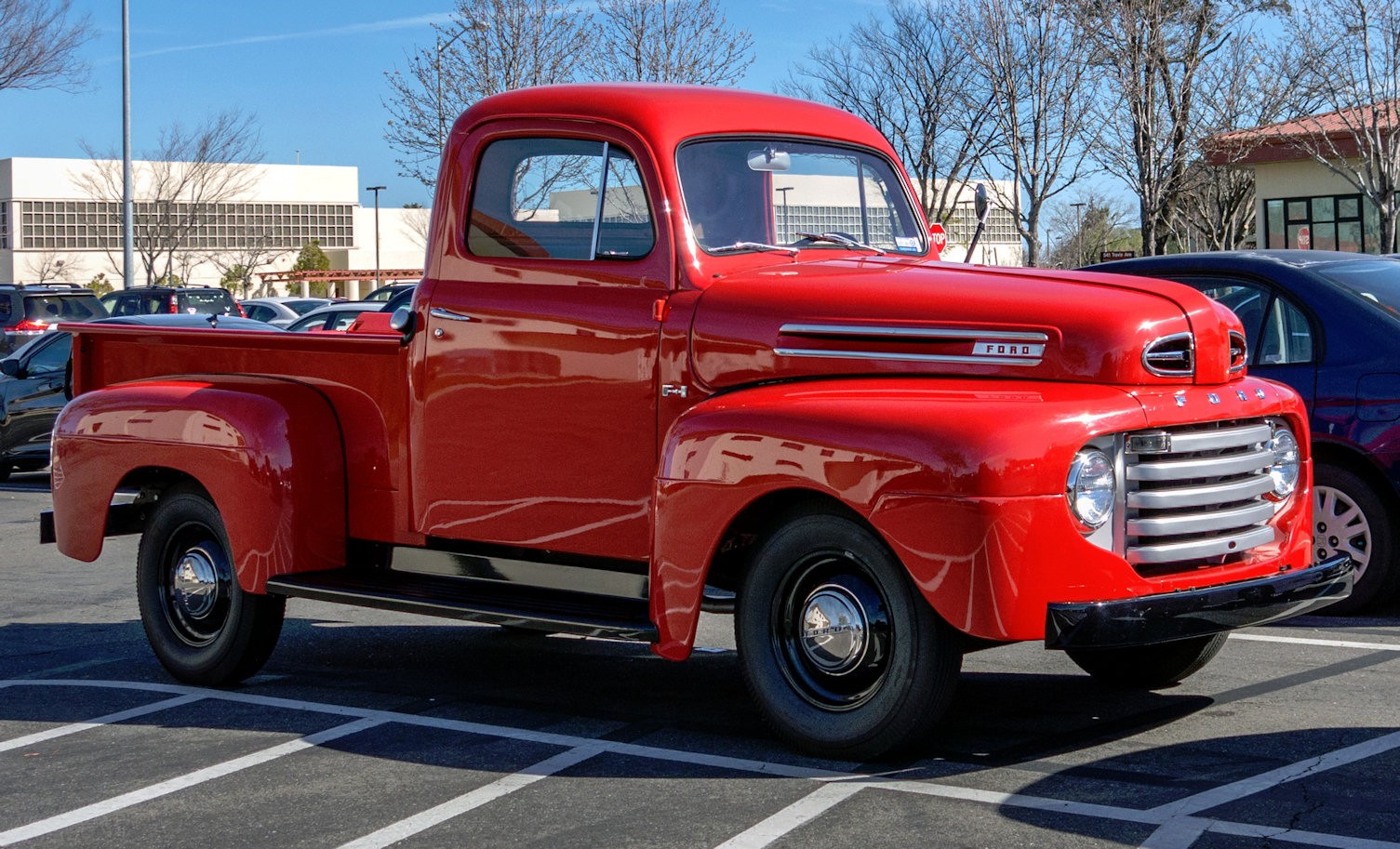 Red Truck Parked in Lot