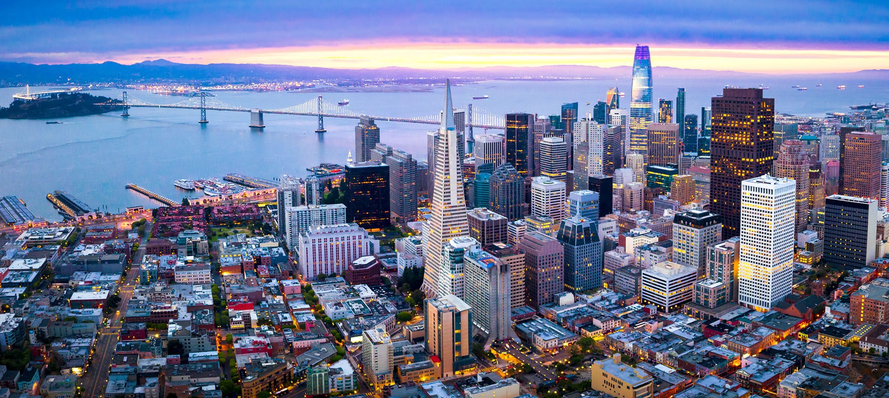 San Franciscos skyline at sunset.